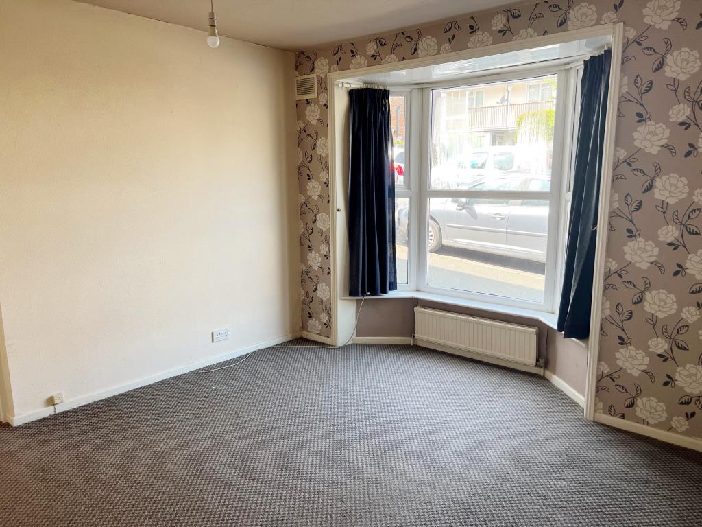 Lot: 164 - TOWN CENTRE SIX-BEDROOM HOUSE WITH POTENTIAL - One of the ground floor reception rooms